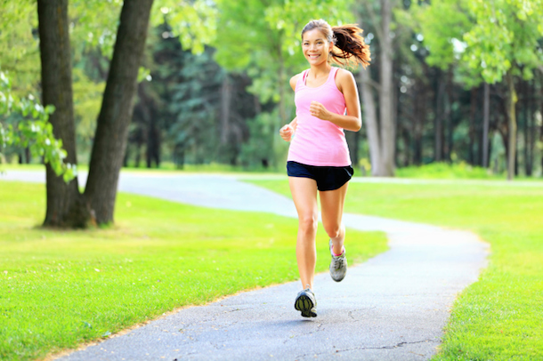 Running woman in park