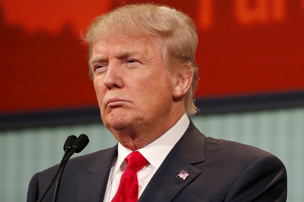 Republican 2016 U.S. presidential candidate businessman Donald Trump listens to a question at the first official Republican presidential candidates debate of the 2016 U.S. presidential campaign in Cleveland, Ohio, August 6, 2015. REUTERS/Brian Snyder - RTX1NEFT