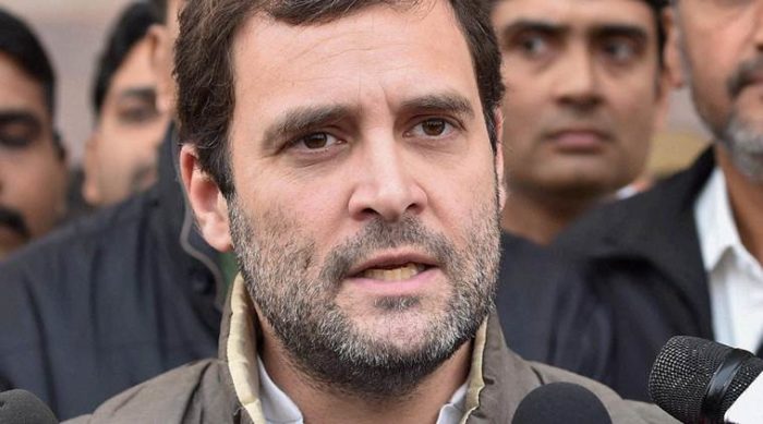 RPT--Lucknow : Congress Vice President Rahul Gandhi talks to media at Chowdhury Charan Singh Airport in Lucknow before leaving for New Delhi on Thursday. PTI Photo by Nand Kumar (PTI12_24_2015_000064A)