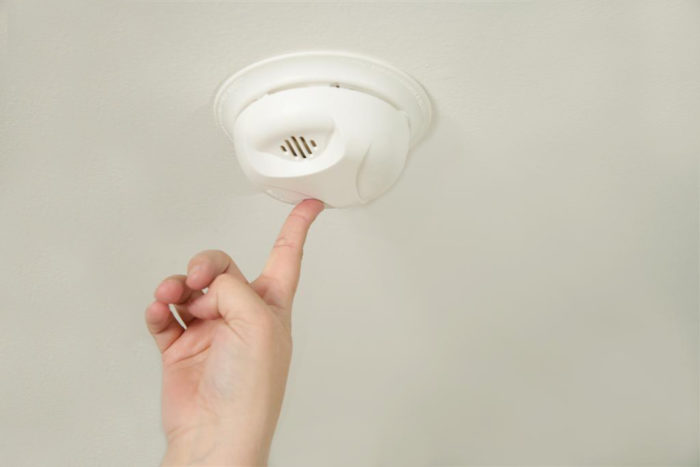 testing-smoke-alarm-Boston-Rules