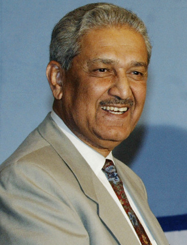 24 Dec 2003, ISLAMABAD, Pakistan --- The father of Pakistan's nuclear bomb, Abdul Qadeer Khan, attends a function in Islamabad in this December 24, 2003 file photo. The father of Pakistan's atomic bomb acted independently in selling nuclear secrets to Iran, Libya and North Korea, the military said on February 3, 2004, while denying that the trade continued under the current government. --- Image by © MIAN KHURSHEED/Reuters/Corbis