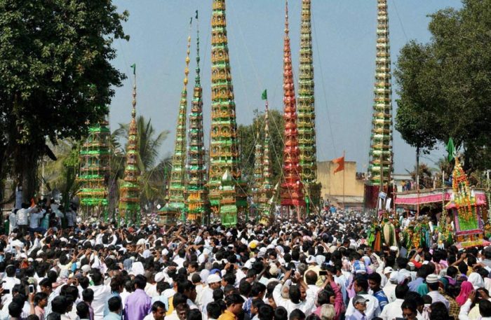 Sangli: Muslims carry Taziyas during a Muharram procession at Kadegaon village in Sangli, Maharashtra on Tuesday. PTI Photo (PTI11_4_2014_000069B)